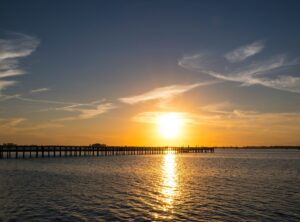 Mesmerizing sunset over the fishing pier in Dunedin, Florida, US